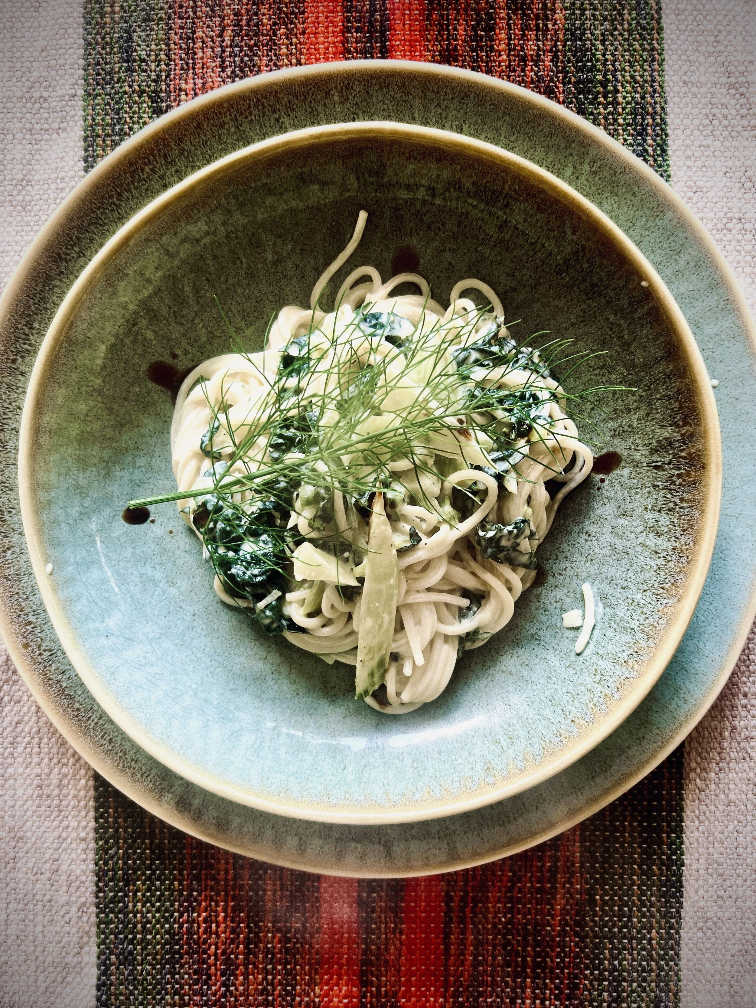 Tagliatelle in romige venkel-palmkool saus