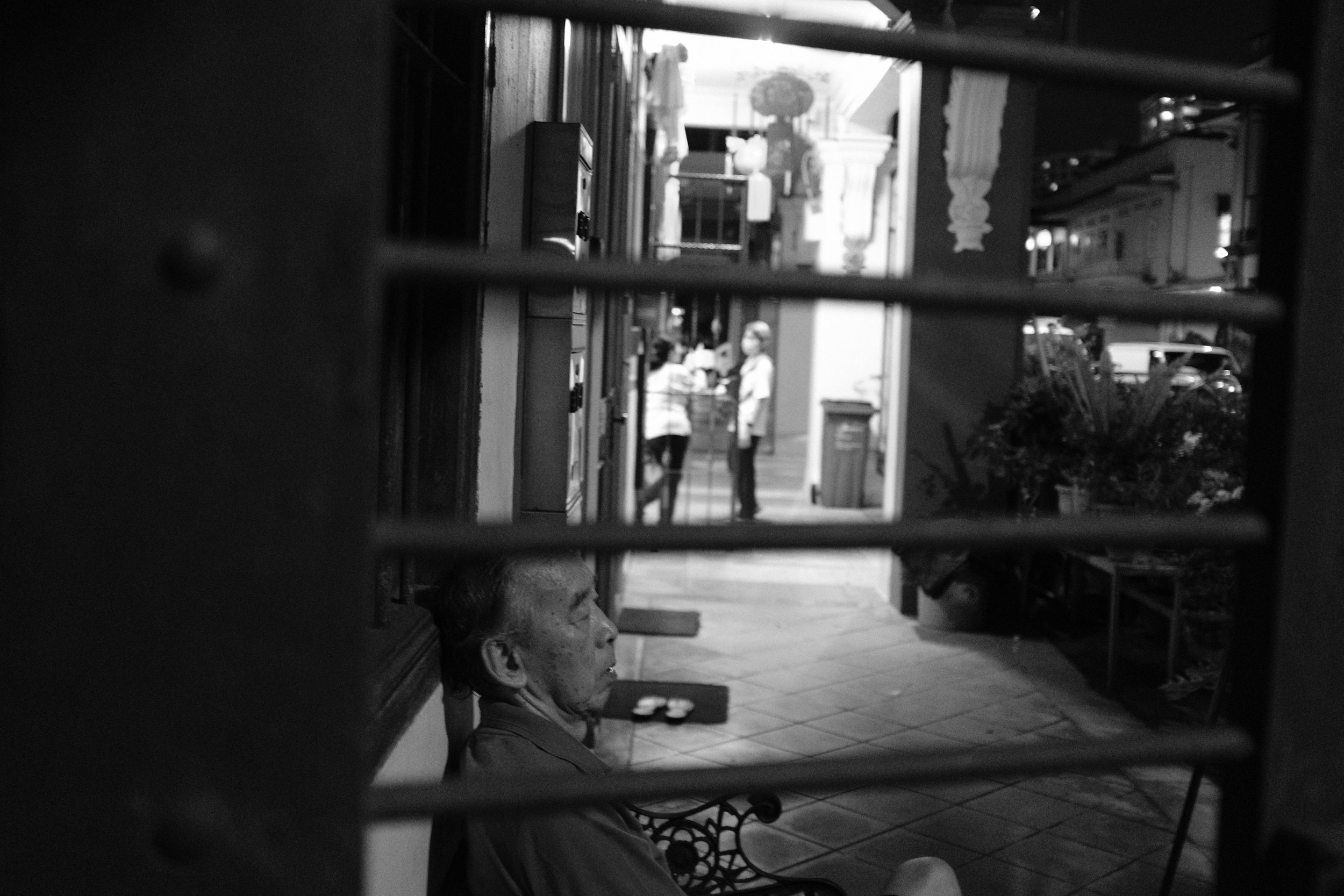 Random man sleeping on my bench