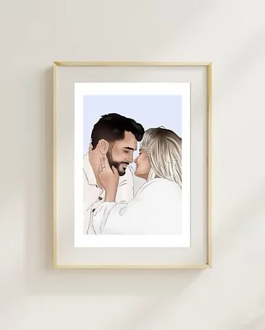 A framed photo of a man and woman looking at each other affectionately, with the woman touching the man's face.