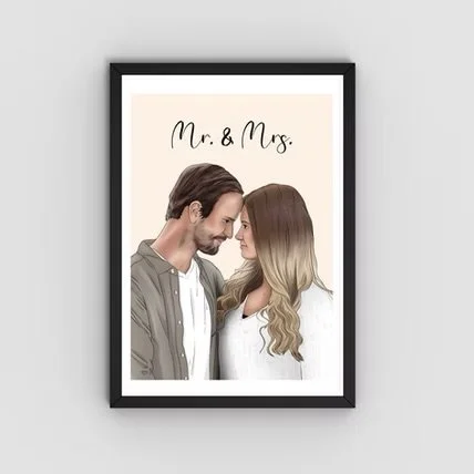 A framed portrait of a couple with foreheads touching, smiling, labeled 'Mr. & Mrs.'