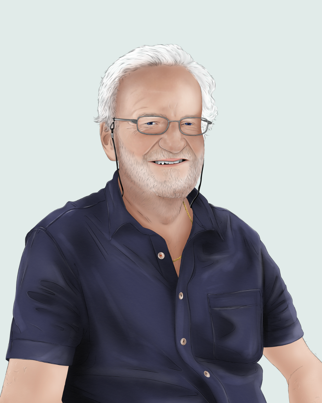 An elderly man with white hair, glasses, and a beard, smiling in a navy blue shirt, wearing a gold chain and earphones.