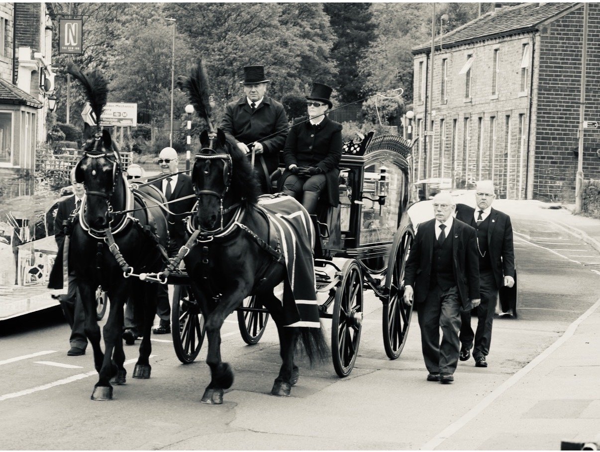 A funeral cortege from Pearson Funeral Service in Marsden, West Yorkshire.