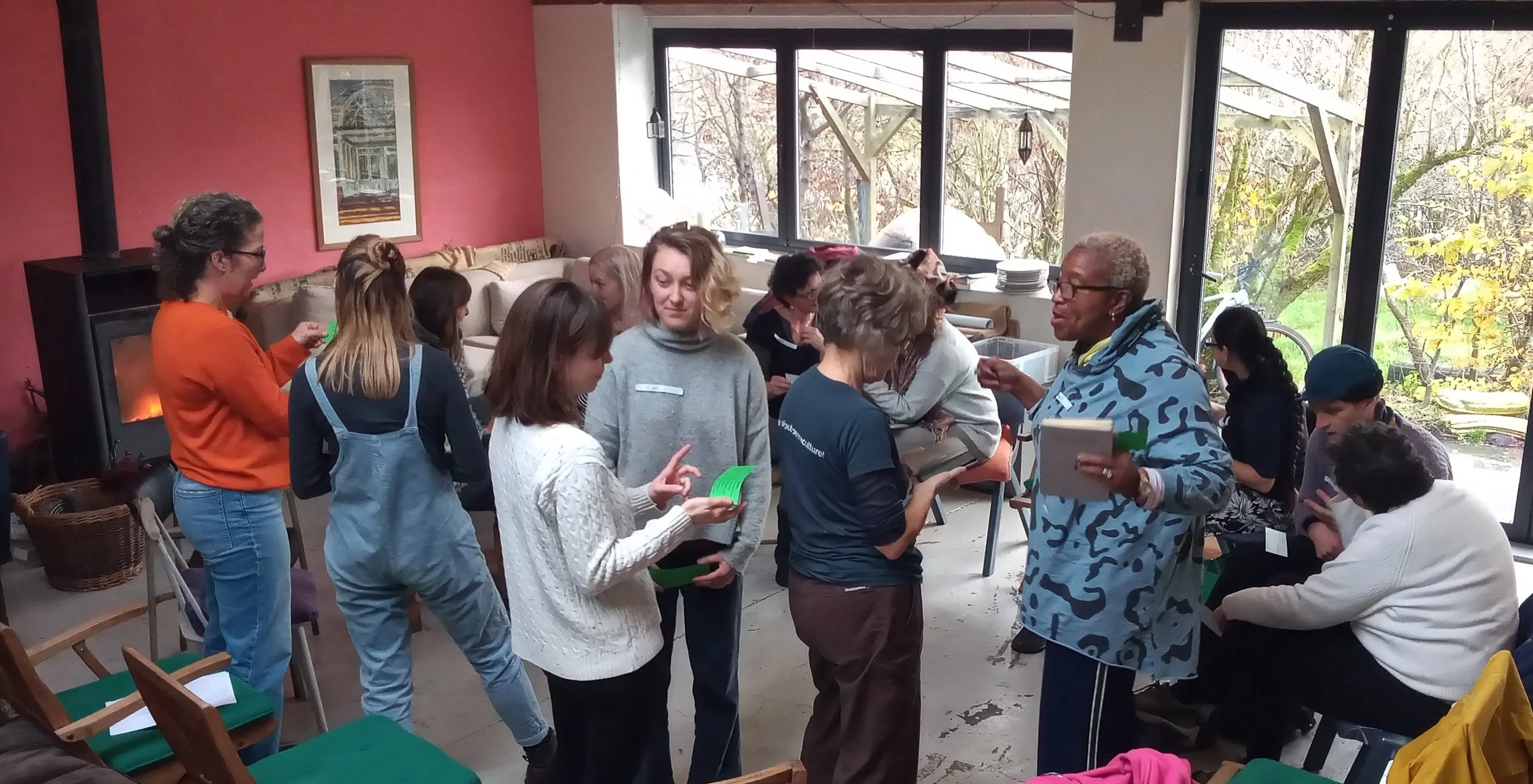 People gathered at a course held at Edibles, a permaculture smallholding and events space.