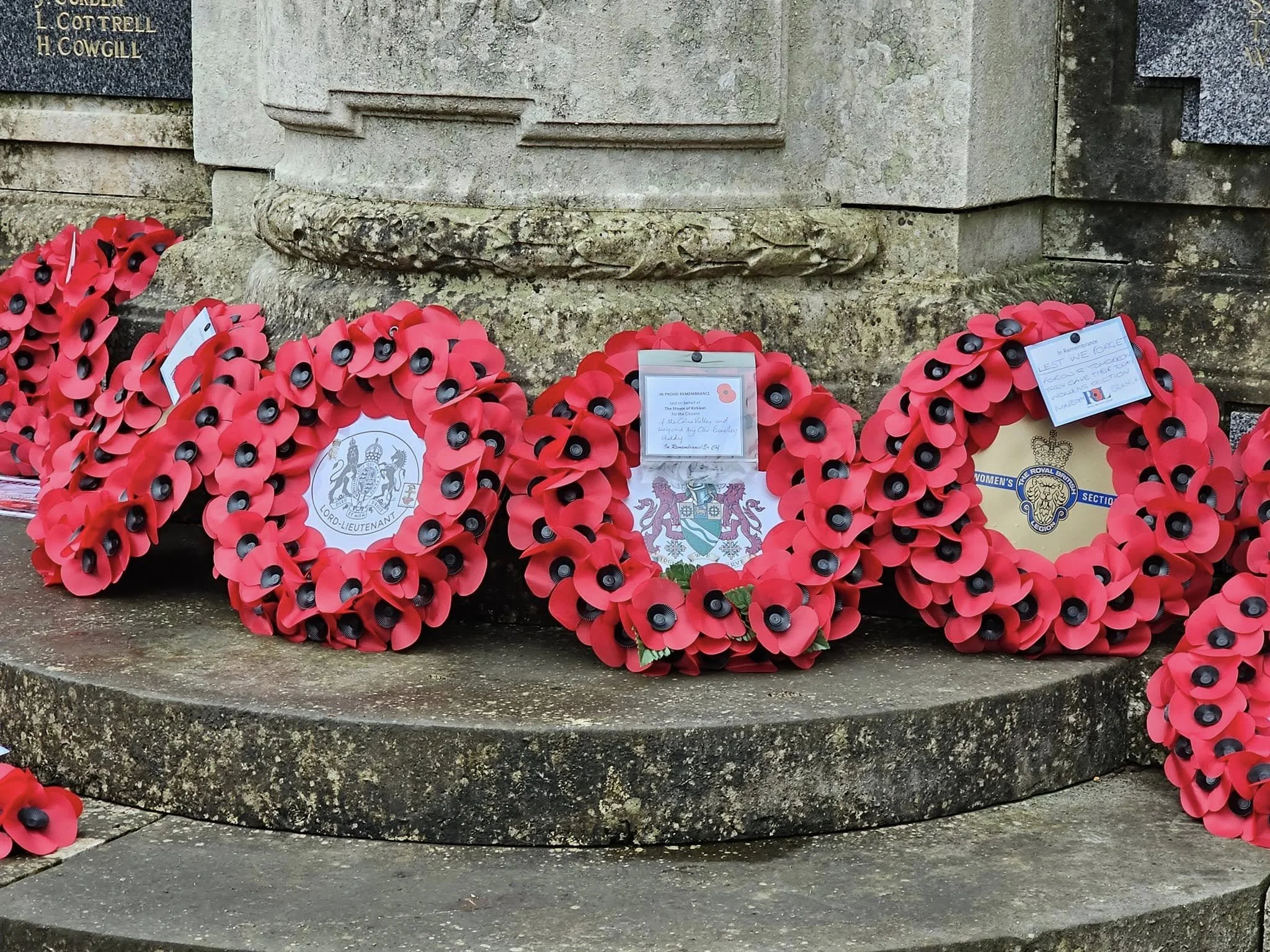 Poppy wreaths at the war memorial in the village of Marsden, West Yorkshire.