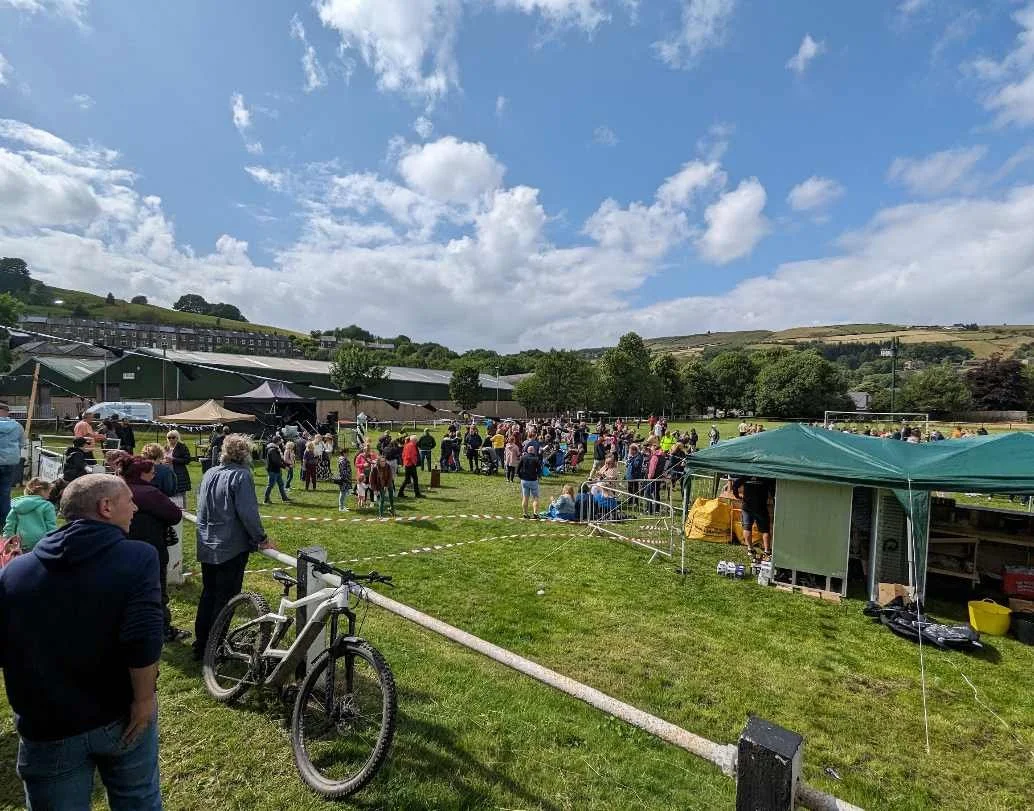 People gathered to enjoy Marsden Footy Fest at Marsden Football Club, West Yorkshire.