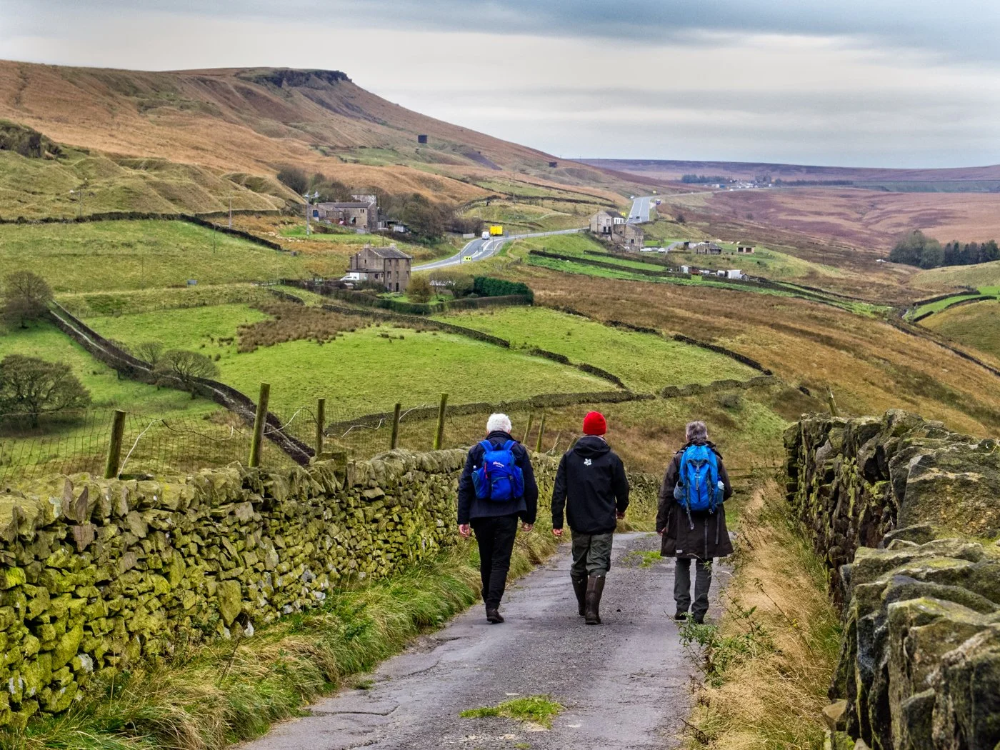 Walkers enjoying the countryside around Marsden, West Yorkshire.