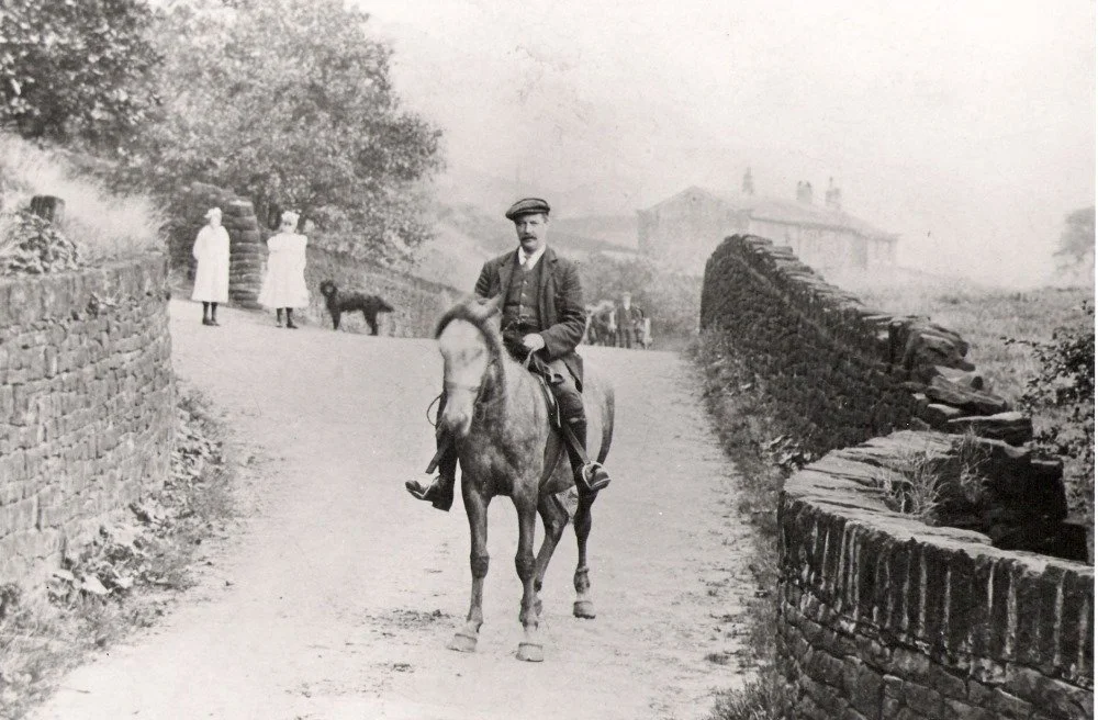 An old photo of a man on a horse in Marsden, West Yorkshire.