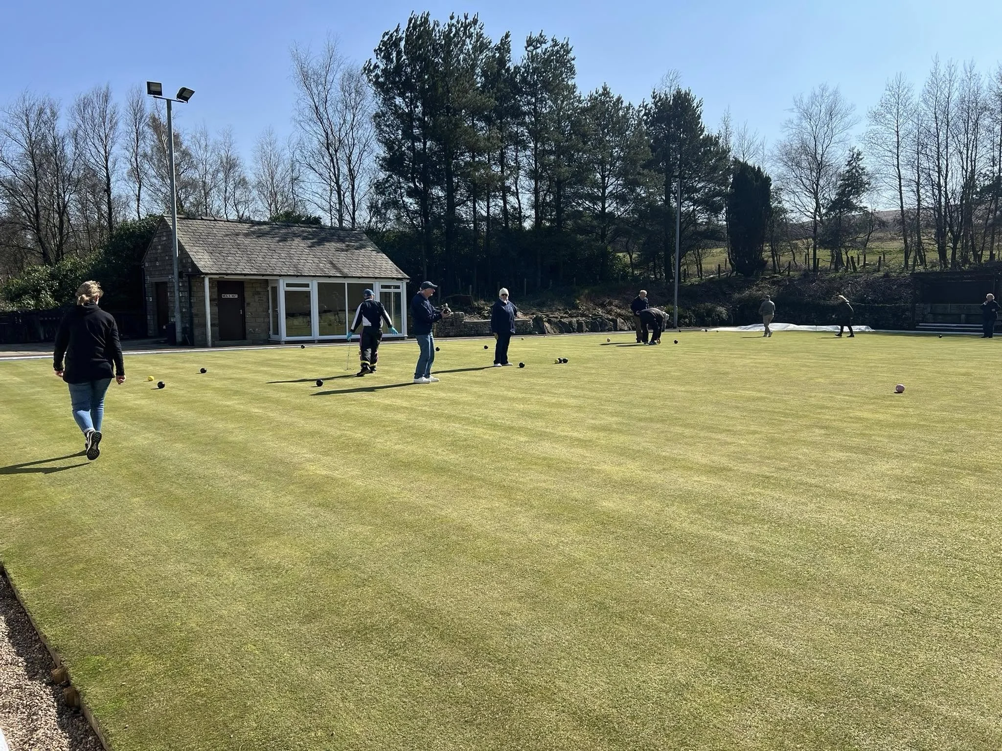 A game of bowls in progress at Hemplow Bowling Club in Marsden, West Yorkshire.