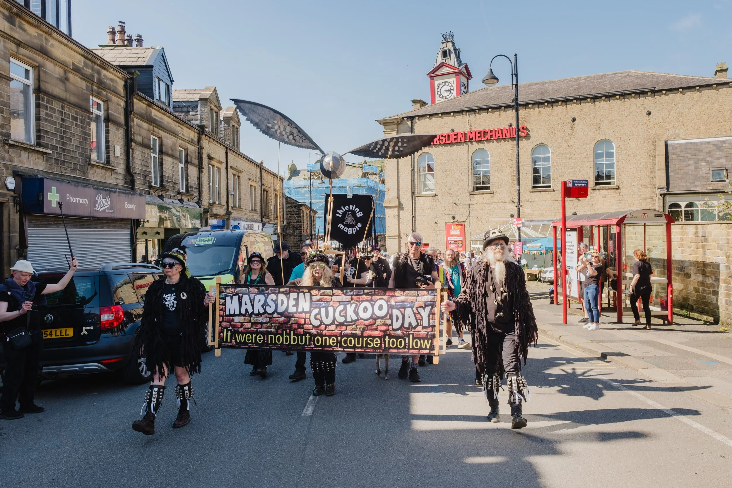 The parade during Marsden Cuckoo Day in Marsden, West Yorkshire.