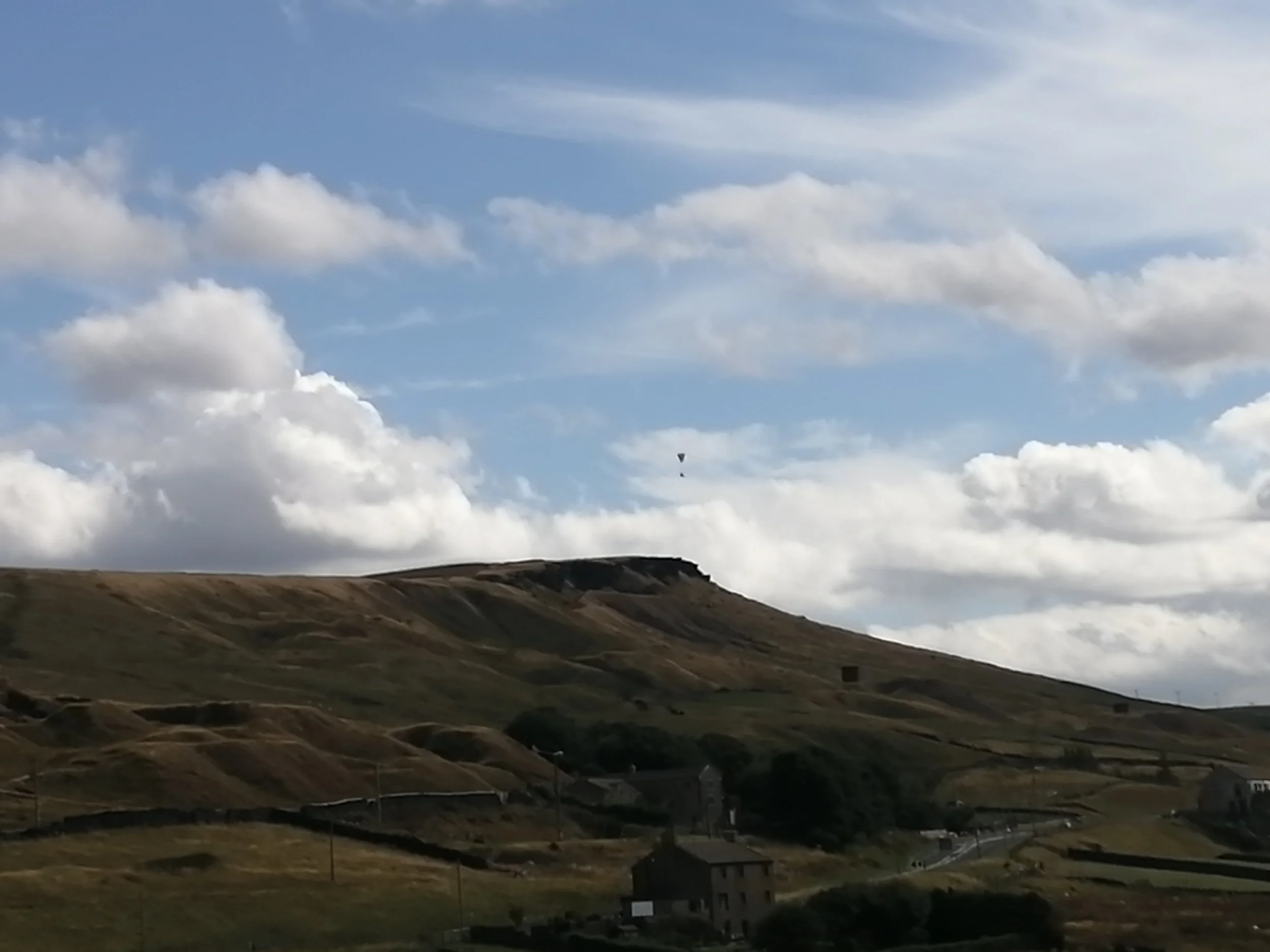 Pule Hill with paraglider overhead - Steven Carr