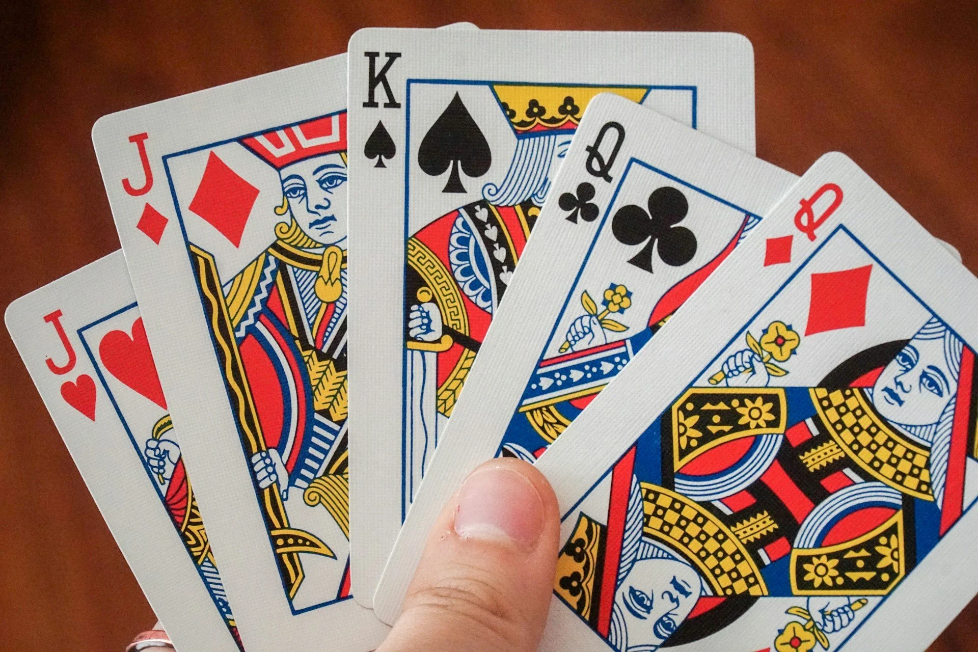 Playing cards being held in a fan.