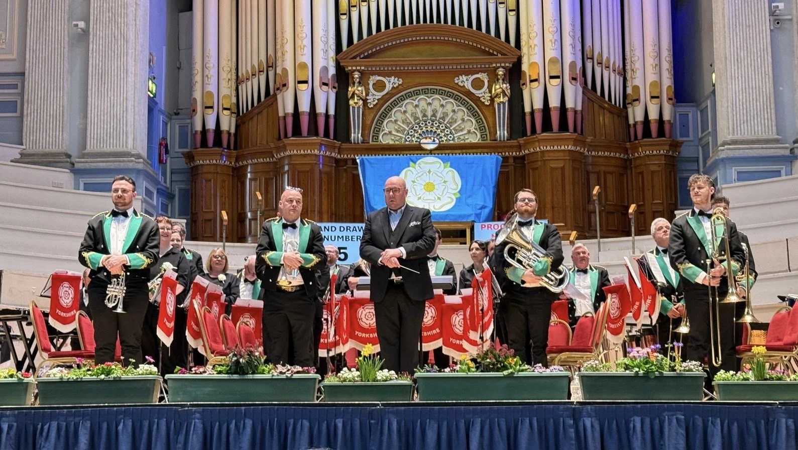 Marsden Silver Prize Brass Band performing on stage.