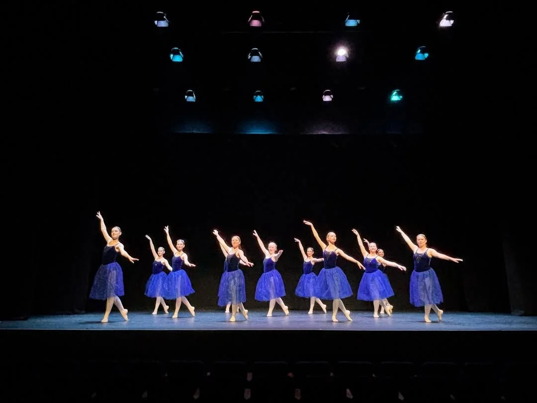 Members of the Bernadette Heys School of Theatre Dance performing on stage.