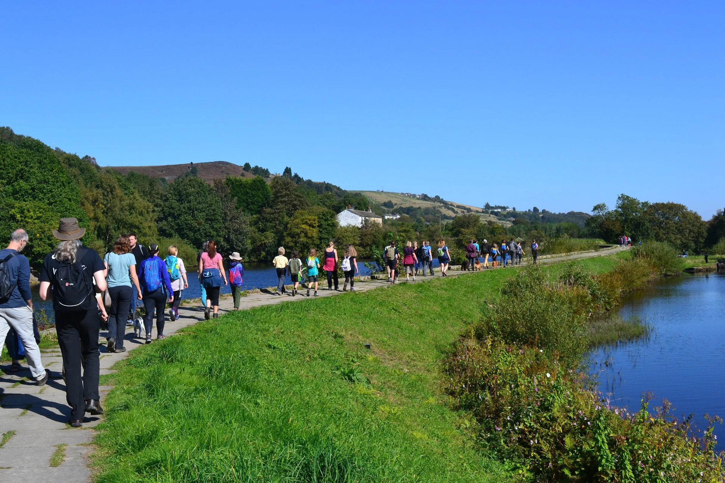 People walking during the Marsden Walkers Are Welcome Walking Festival in West Yorkshire.
