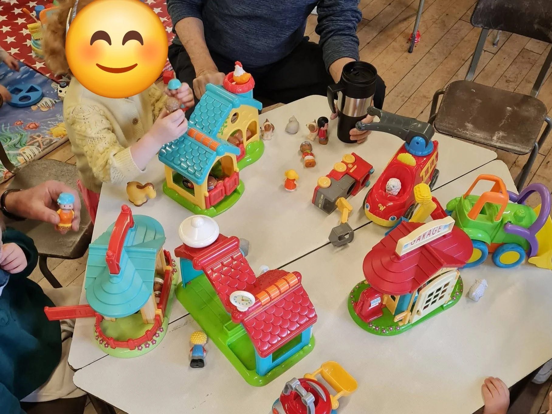 Children playing with toys at Tiny Tots pre-school playgroup in Marsden, West Yorkshire.
