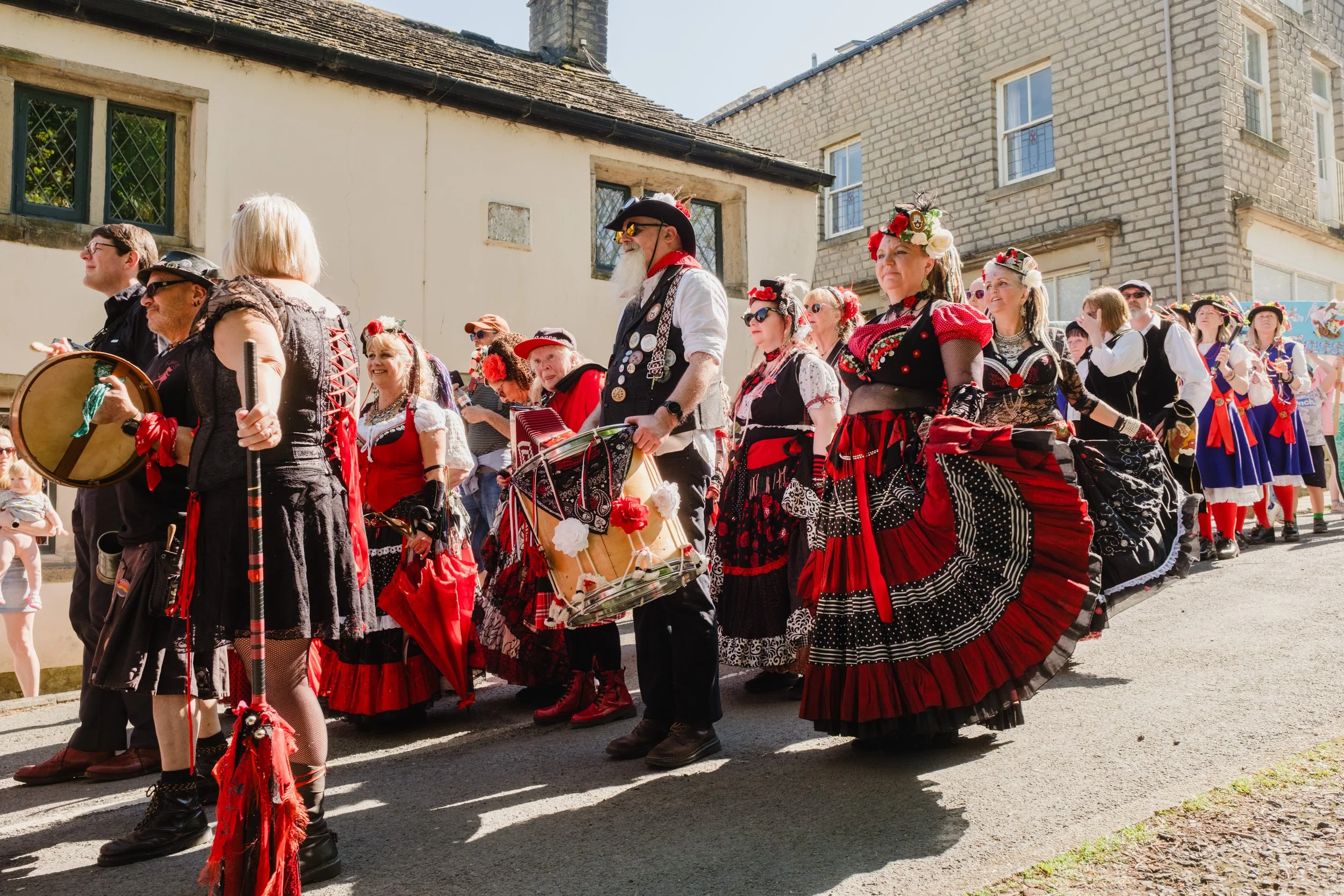 Performers during the Marsden Cuckoo Day parade in Marsden, West Yorkshire.