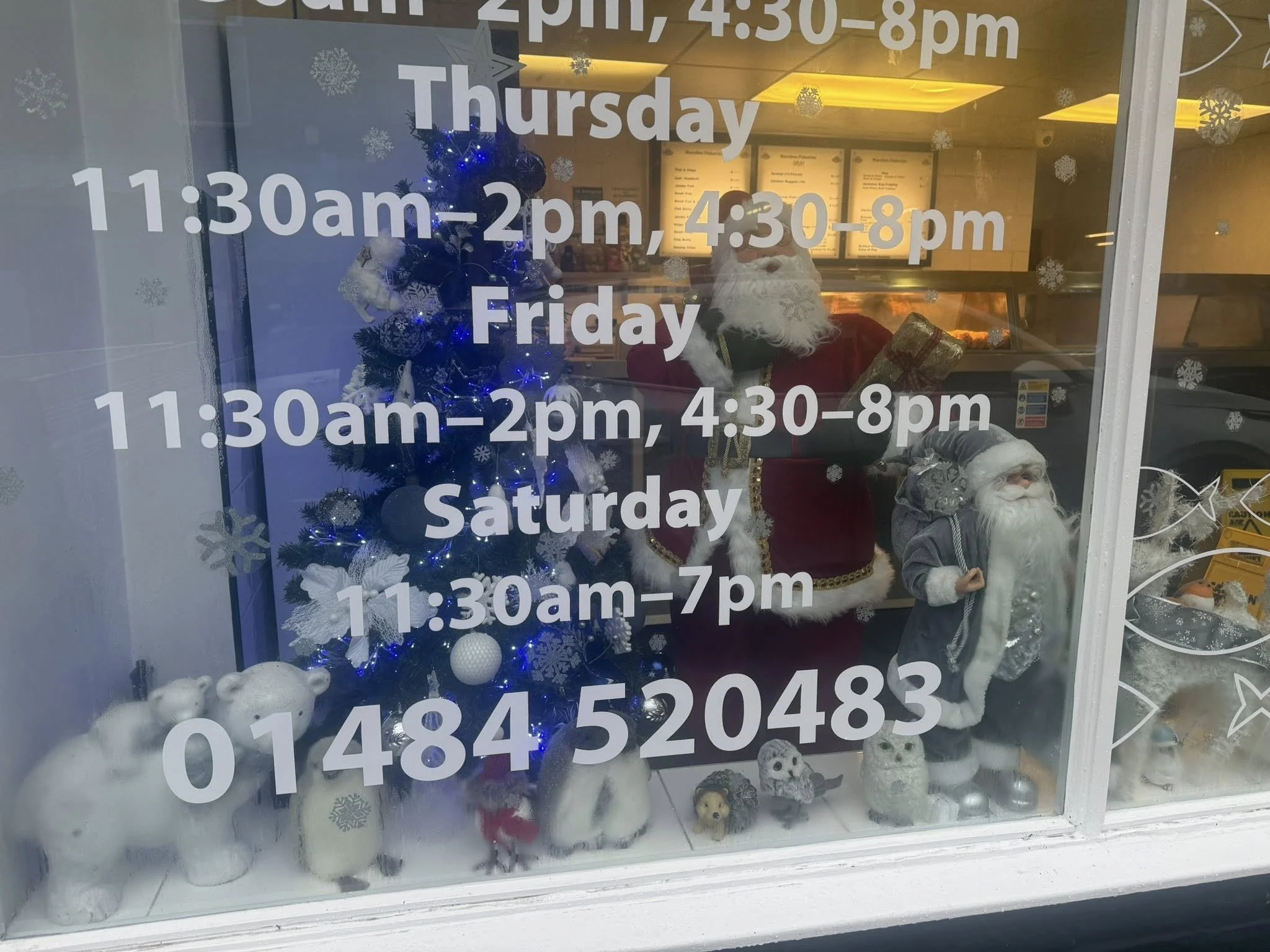 A Christmas window display at Marsden Fisheries in Marsden, West Yorkshire.