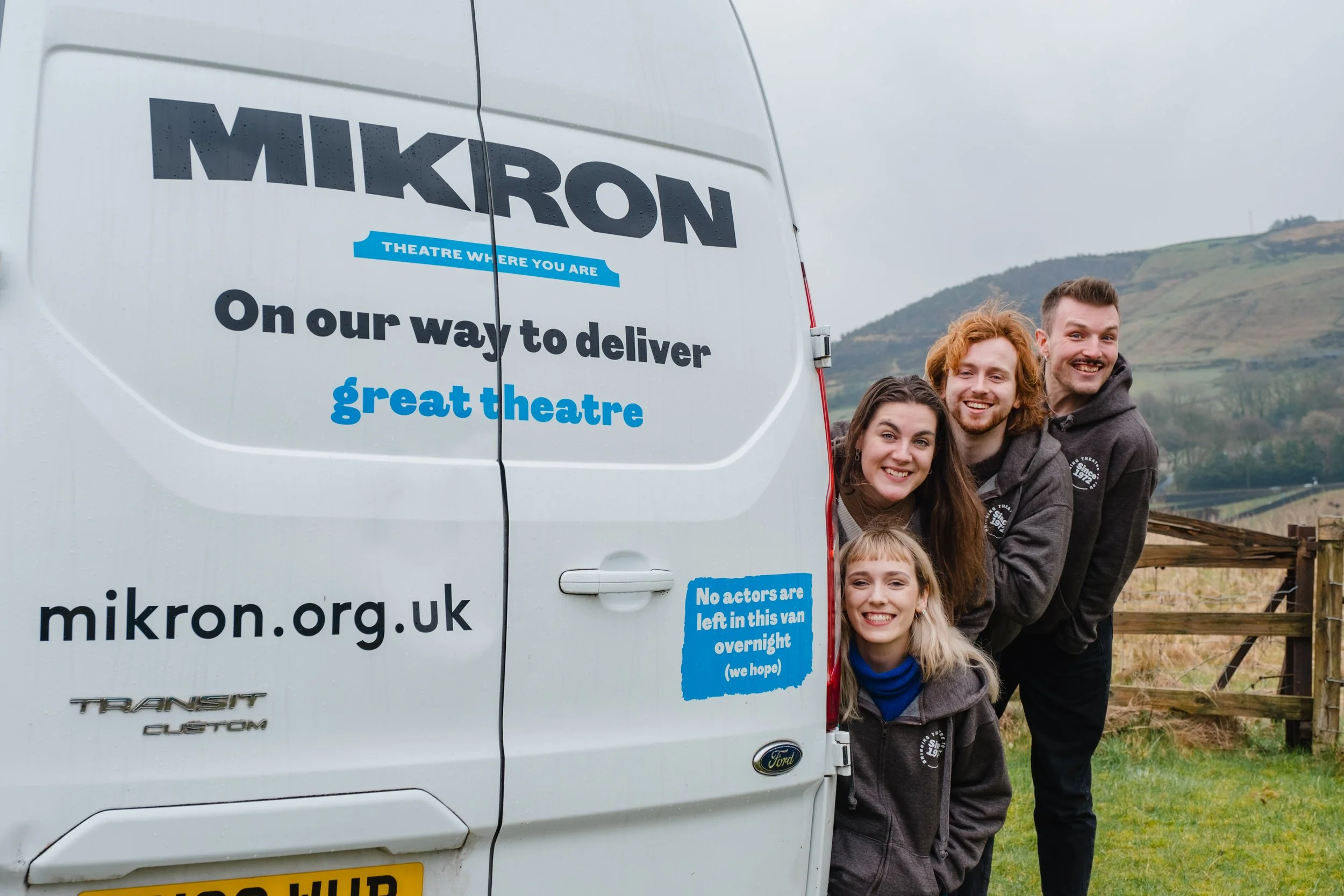 Actors posing to promote Mikron Theatre in Marsden, West Yorkshire.