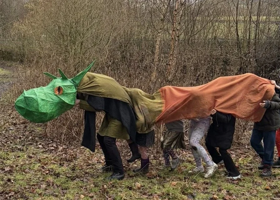 A dragon puppet brought to life during the Imbolc Story Walk in Marsden, West Yorkshire.