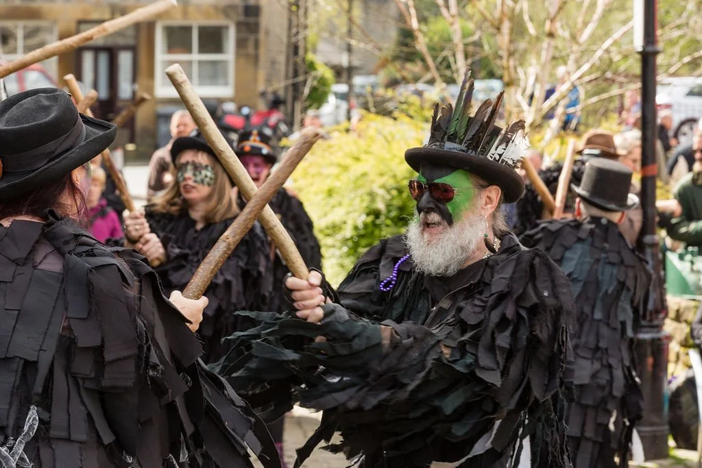 Marsden's Thieving Magpie Border Morris members dancing.