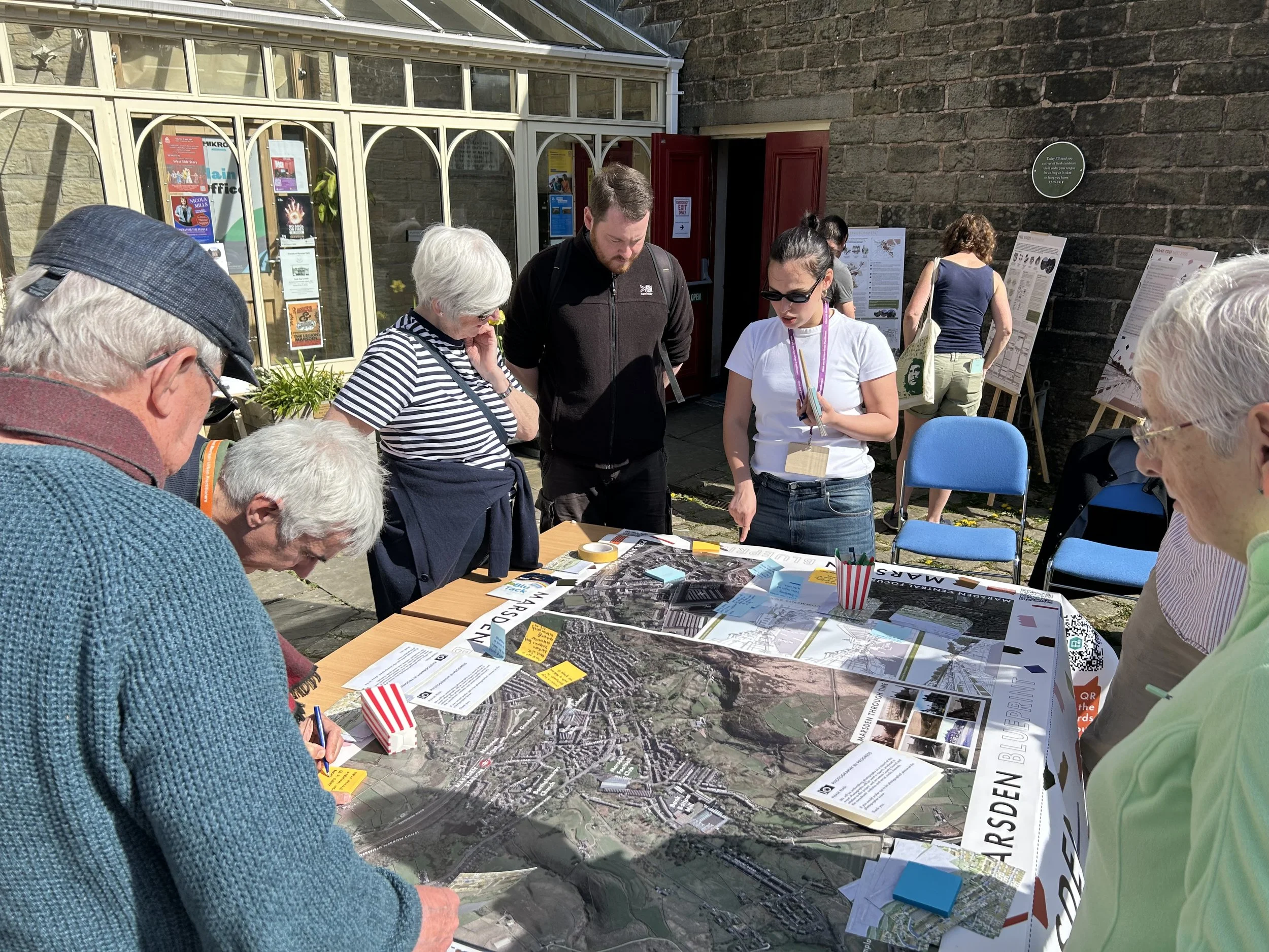 Members of the public looking at a display connected with the Marsden Blueprint.