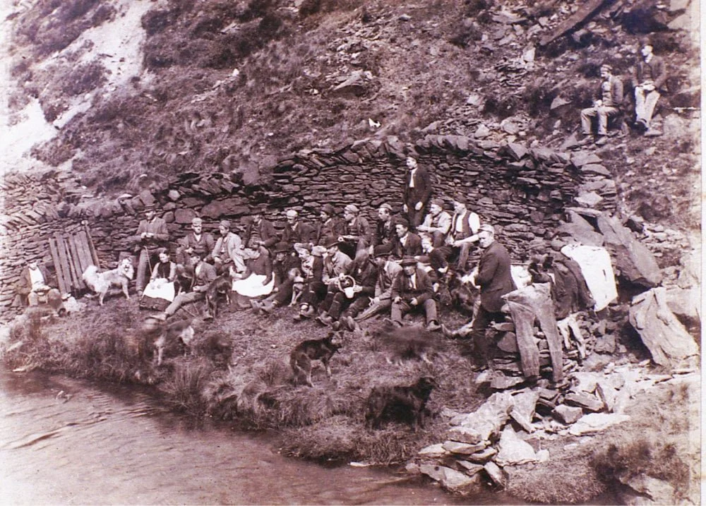 An old photograph of workers resting in Marsden, West Yorkshire.