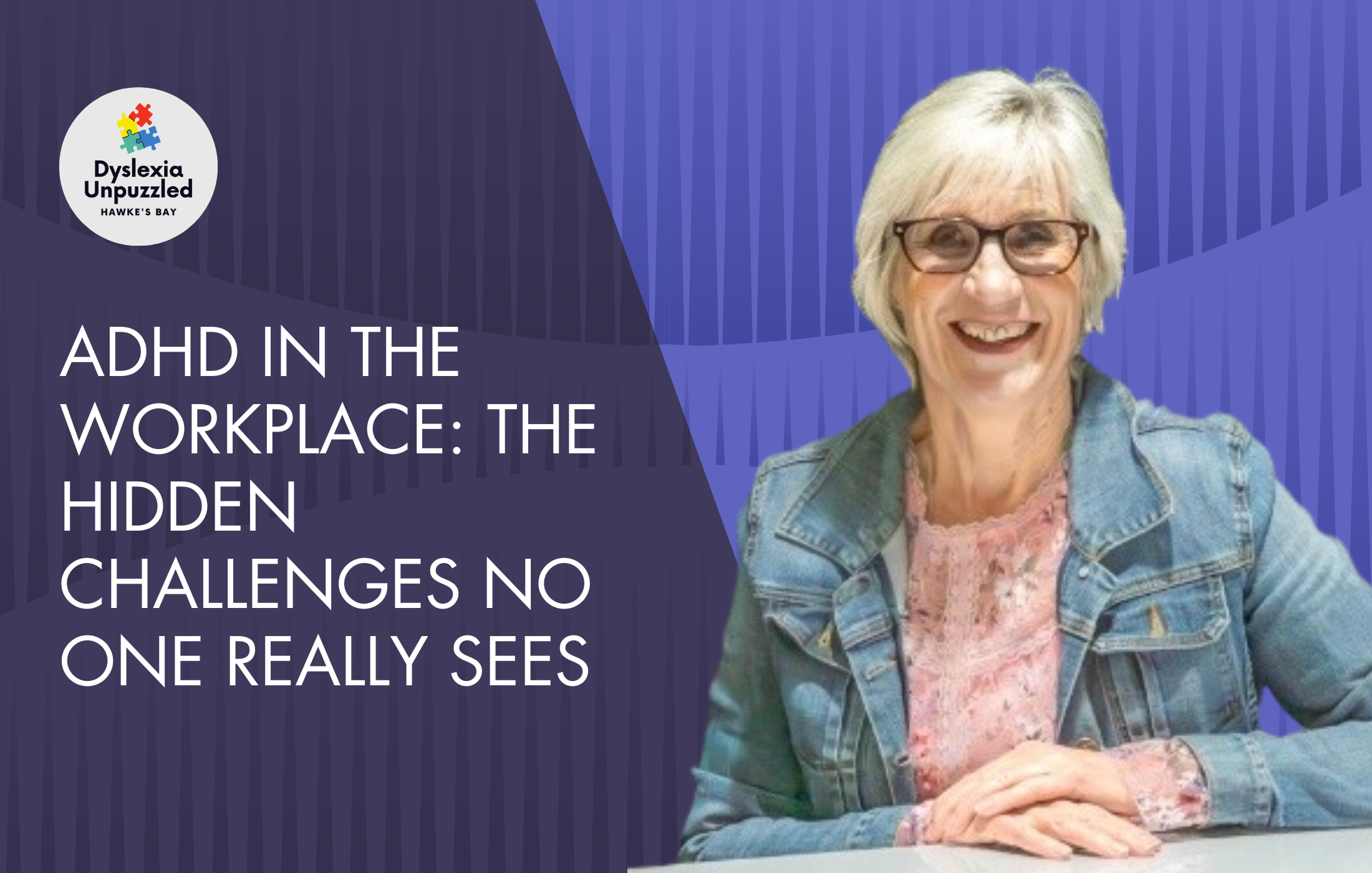 A smiling elderly woman with gray hair, glasses, wearing a denim jacket and floral blouse, sitting at a desk with a blue background featuring diagonal lines. The left corner has a logo with puzzle pieces and the text 'Dyslexia Unpuzzled - Hawke's Bay'. The image emphasizes the topic of ADHD in the workplace.