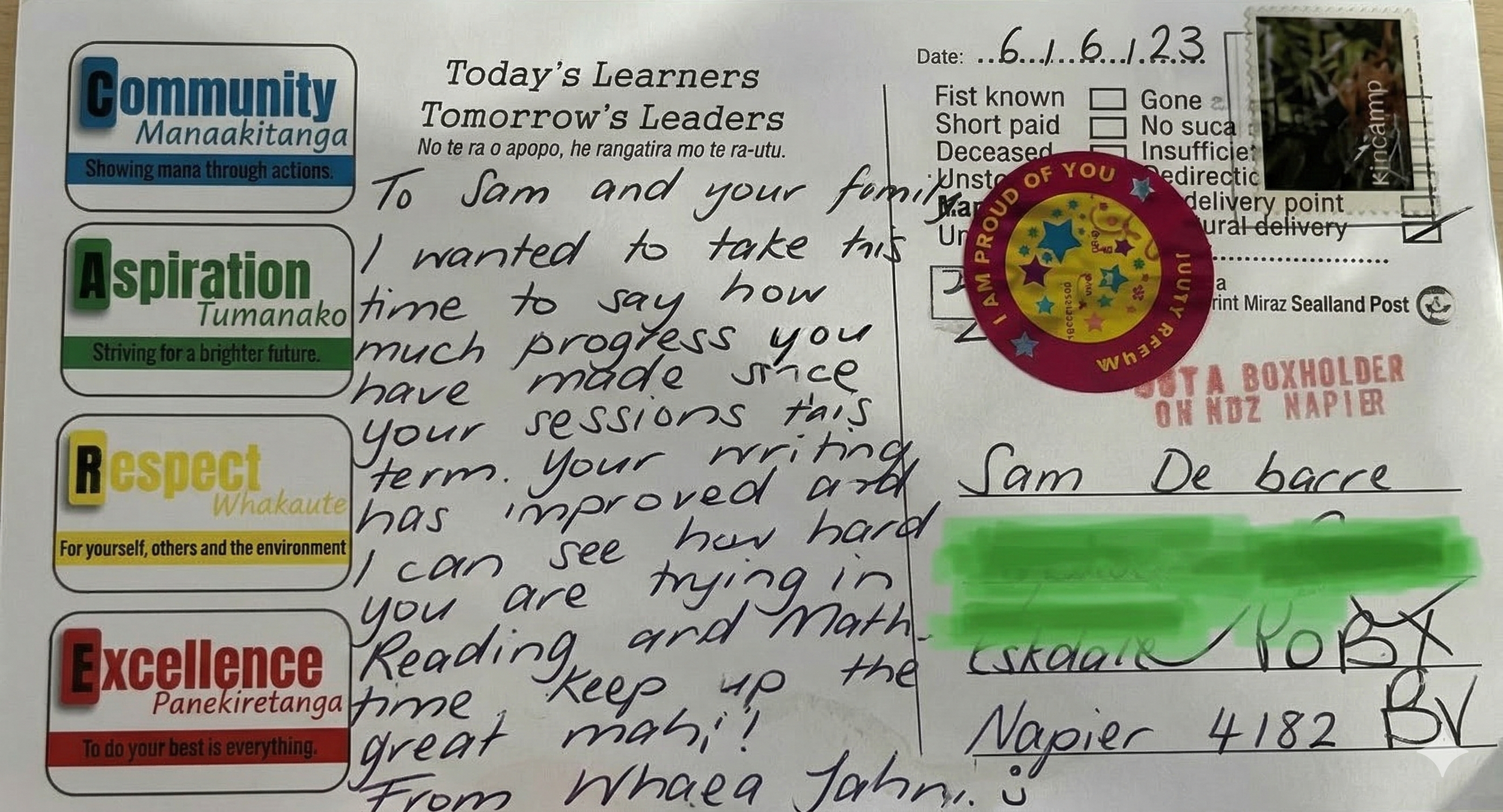 A handwritten letter on a postcard with motivational labels on the left side, including 'Community Manaakitanga: Showing mana through actions,' 'Aspiration Tumanako: Striving for a brighter future,' 'Respect Whakatae: For yourself, others, and the environment,' and 'Excellence Panekiretanga: To do your best is everything.' There is a circular sticker that says 'I AM PROUD OF YOU.' The letter contains cursive handwriting addressed to Sam, discussing progress and appreciation. The top right corner shows the date '6/6/23,' with checkbox options for various statuses, and a signature at the bottom.