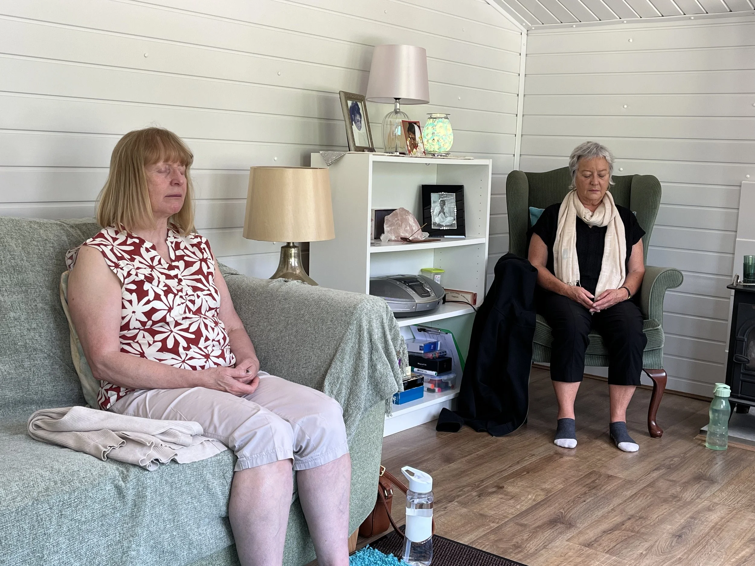 Two students practicing mindfulness meditation in Point Clear, part of our wellness courses serving Colchester.