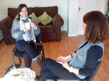 Saguna Katarina Tilley providing a spiritual guidance and alignment one-to-one session for a client at her meditation and healing space.