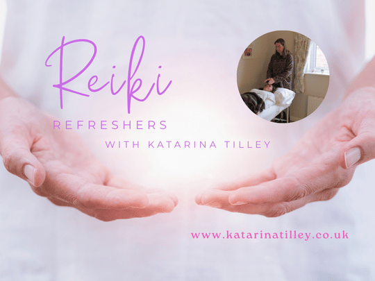Student giving Reiki to Katarina Tilley during a Reiki Refresher Session.