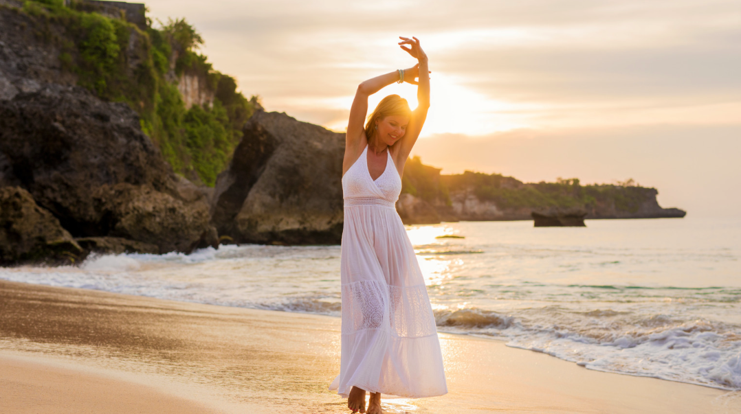 Woman walking by the beach