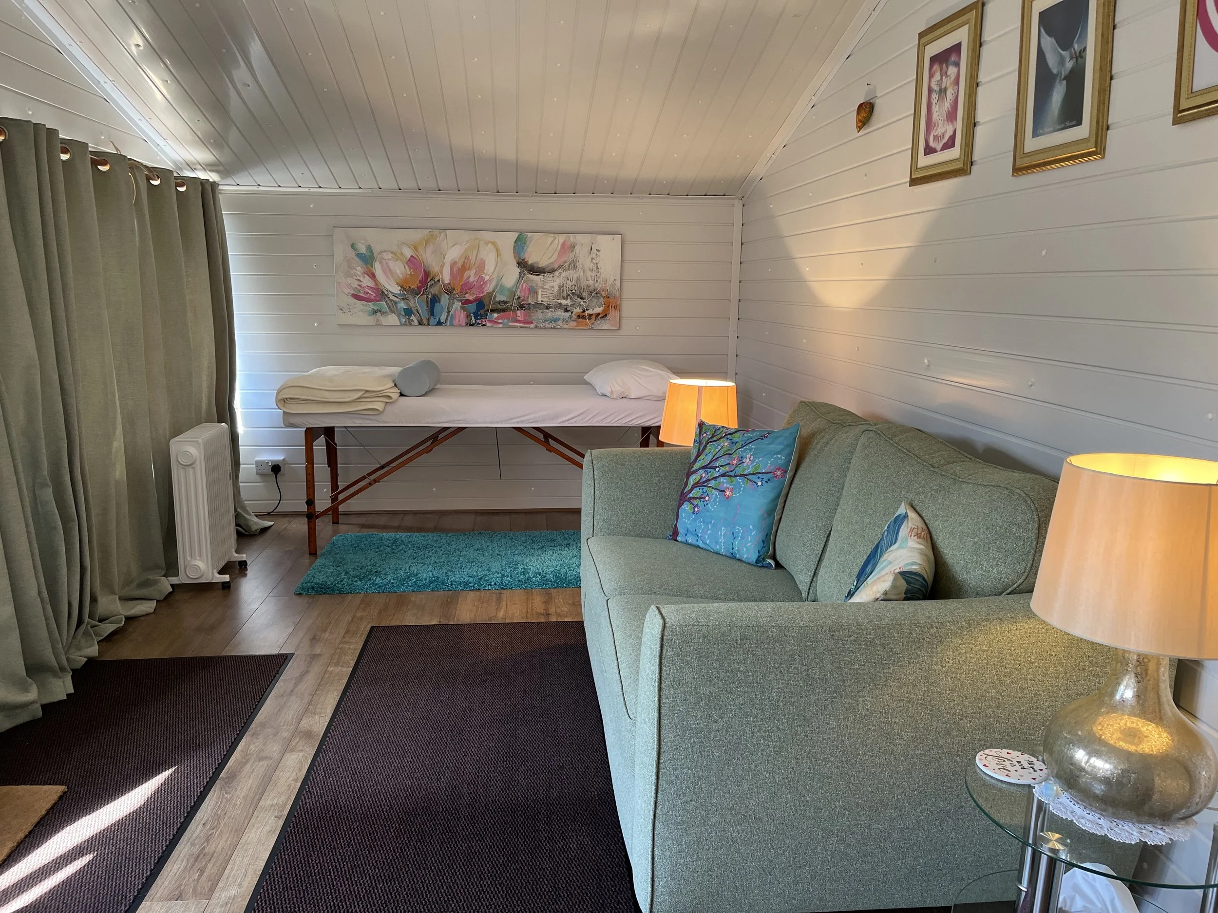 The calm Reiki healing room at Katarina Tilley Meditation Centre in Clacton, featuring the treatment couch for energy healing clients visiting from Clacton, Colchester, and Essex.
