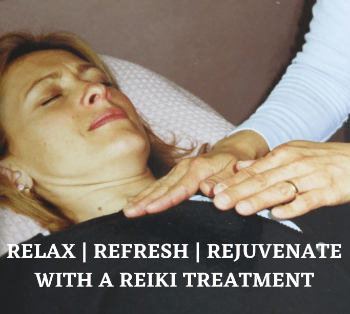 Katarina Tilley giving Reiki healing