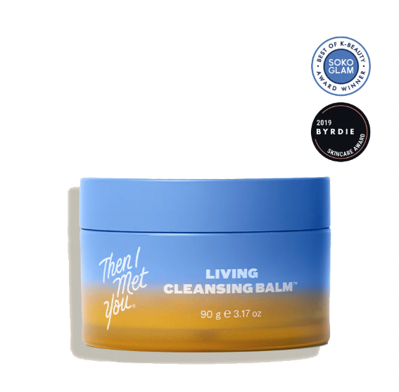 A blue and yellow jar of Then! Method Living Cleansing Balm with award logos on the top right.