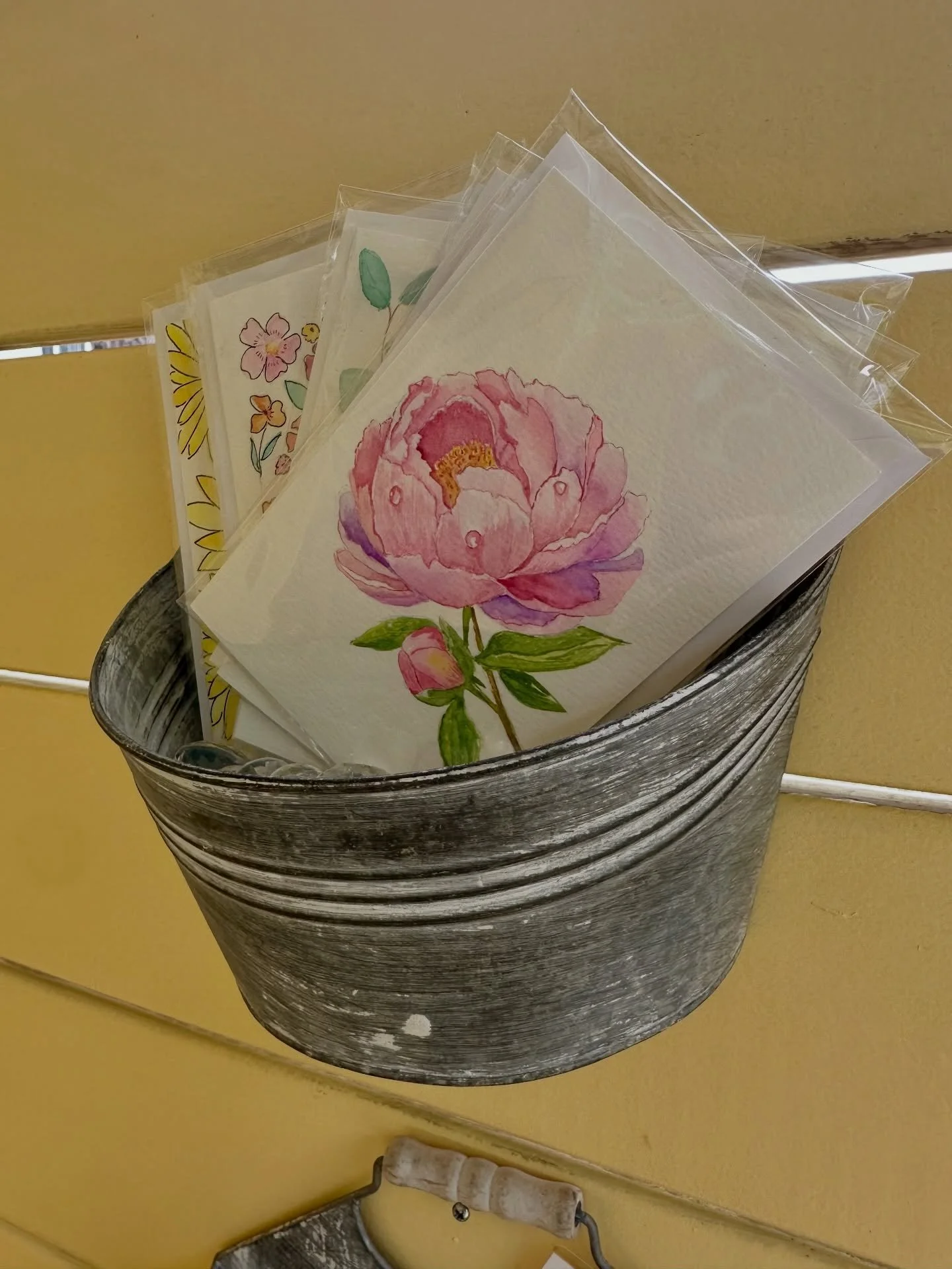 @watercolorhabit has graciously stocked our stand with  hand-painted greeting cards and embellishments for your flowers! Inventory is limited, be sure to snag one for Mother&rsquo;s Day😌 
#mothersday #flowerstand #localflowers #freshcutflowers #peon