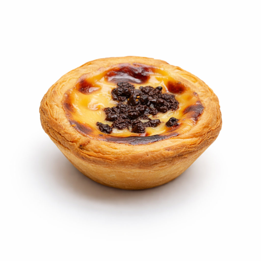 Baked pastry with yellow custard filling and dark chocolate topping on a white background.