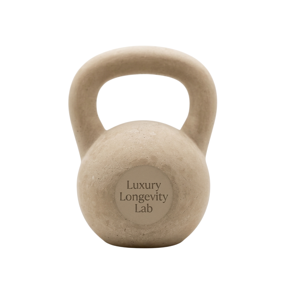 A beige kettlebell with the words 'Luxury Longevity Lab' written on its bottom center.