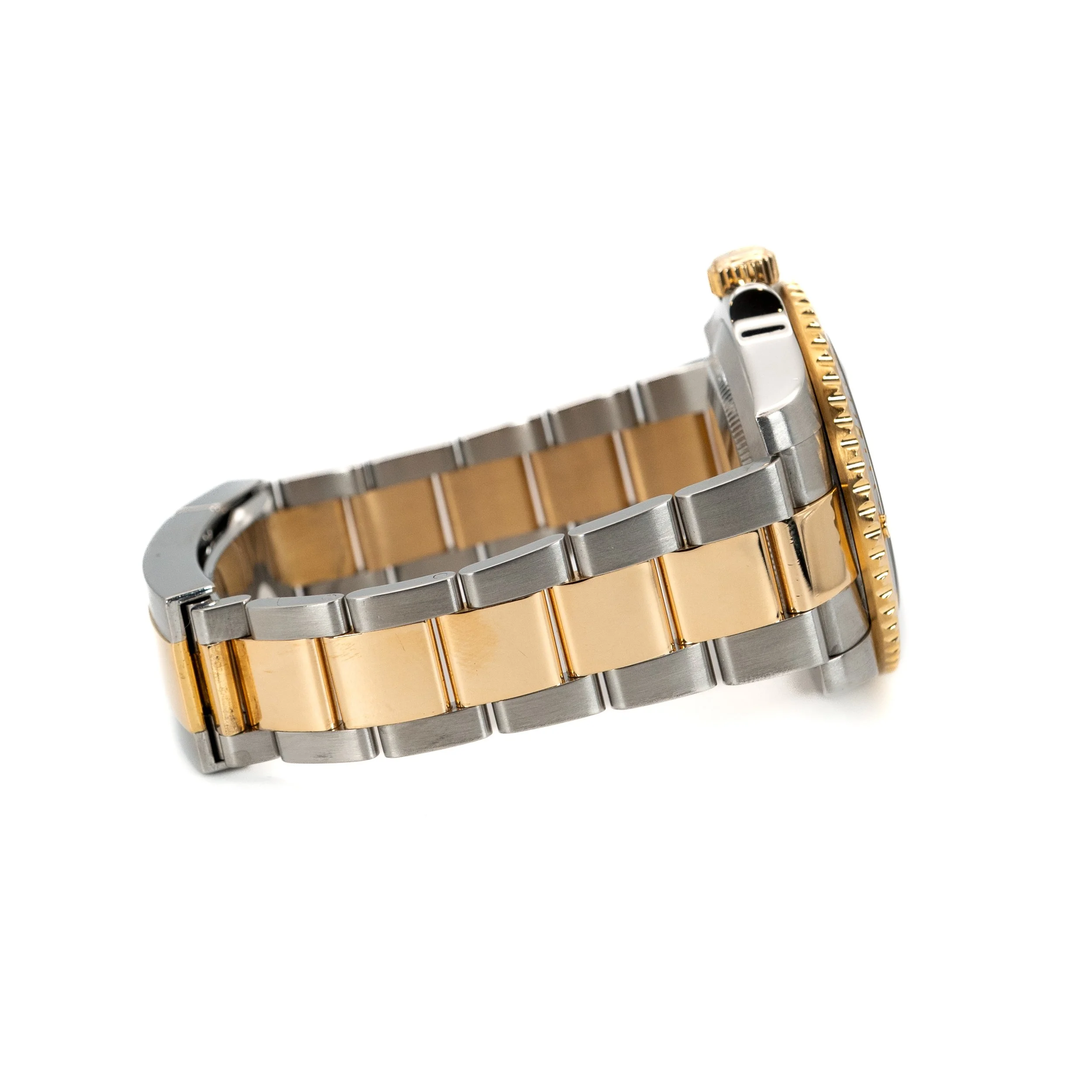 Two-tone metal wristwatch with a silver and gold band and a gold bezel, viewed from the side on a white background.