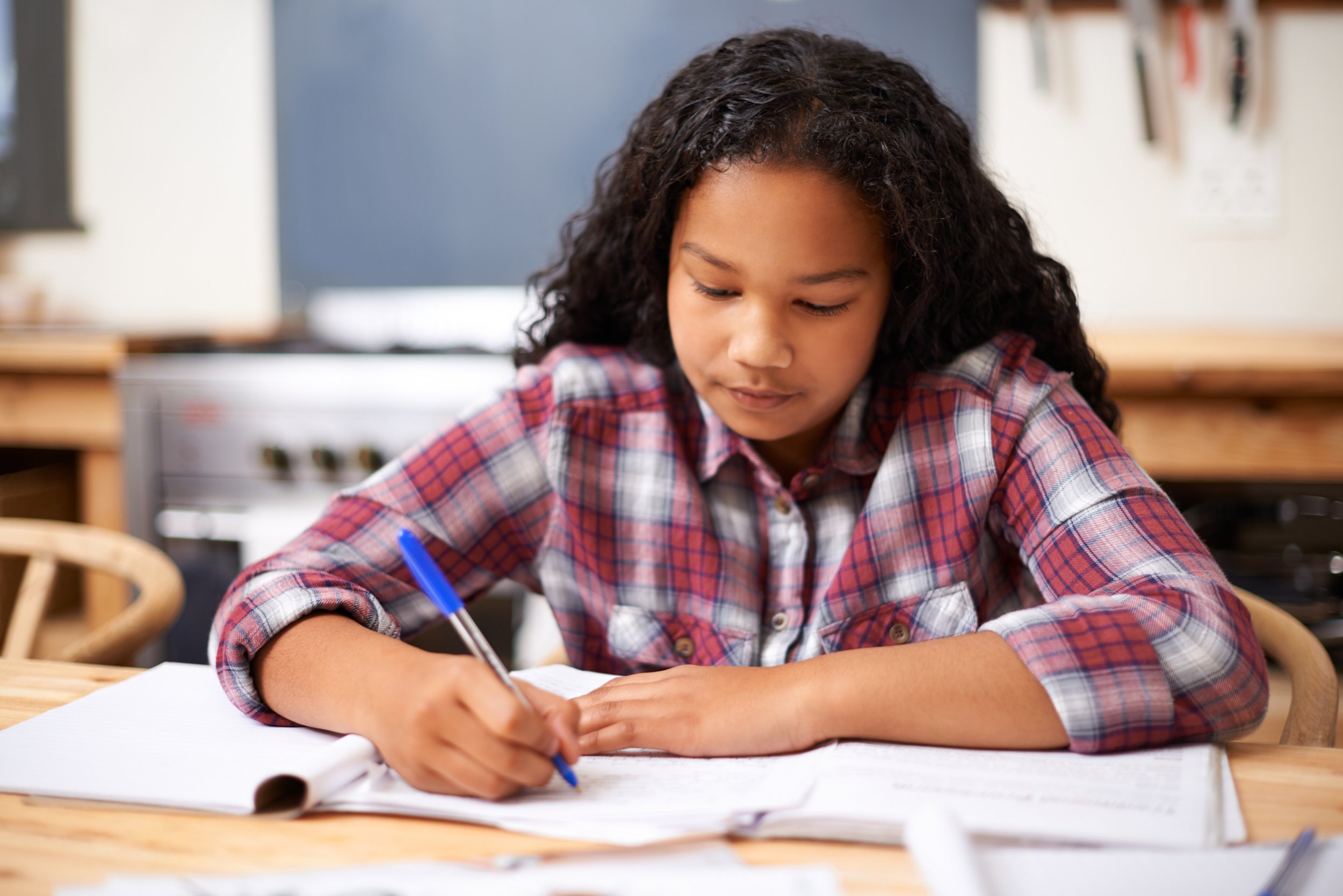 Student working on a writing assignment