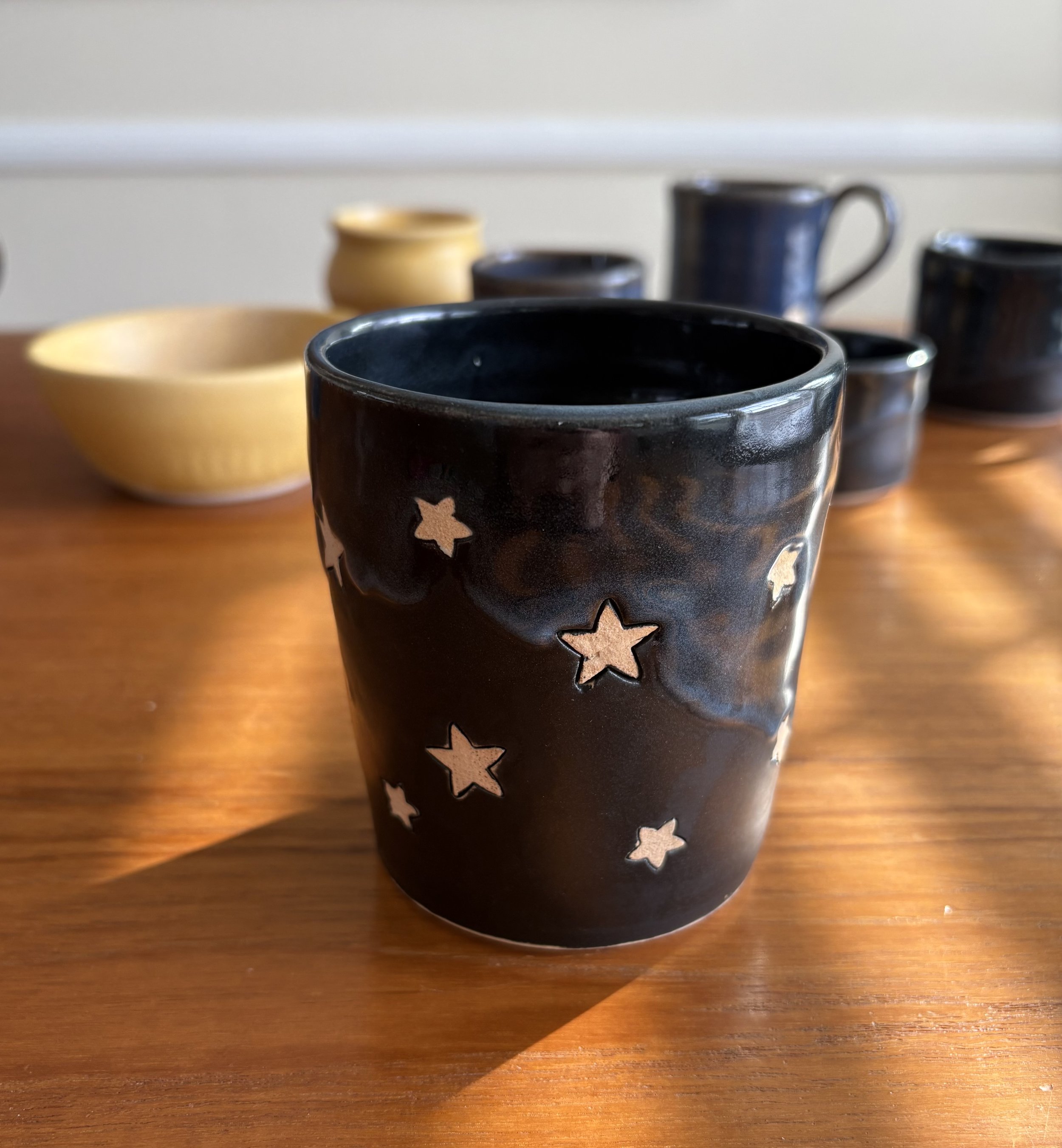 Stoneware cup with stars