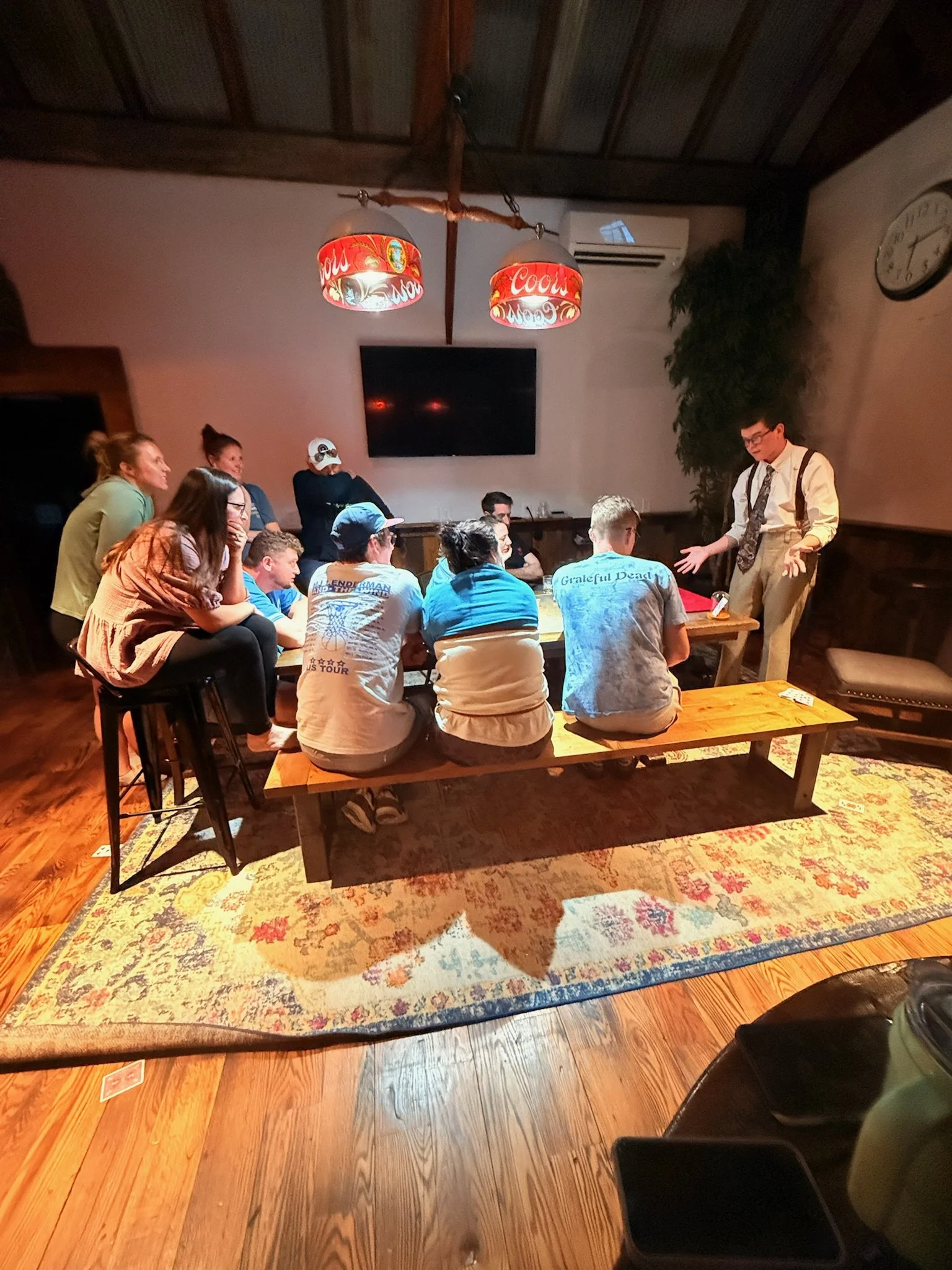 Liam Abner performing strolling magic at a private gathering-magician Summit County Colorado