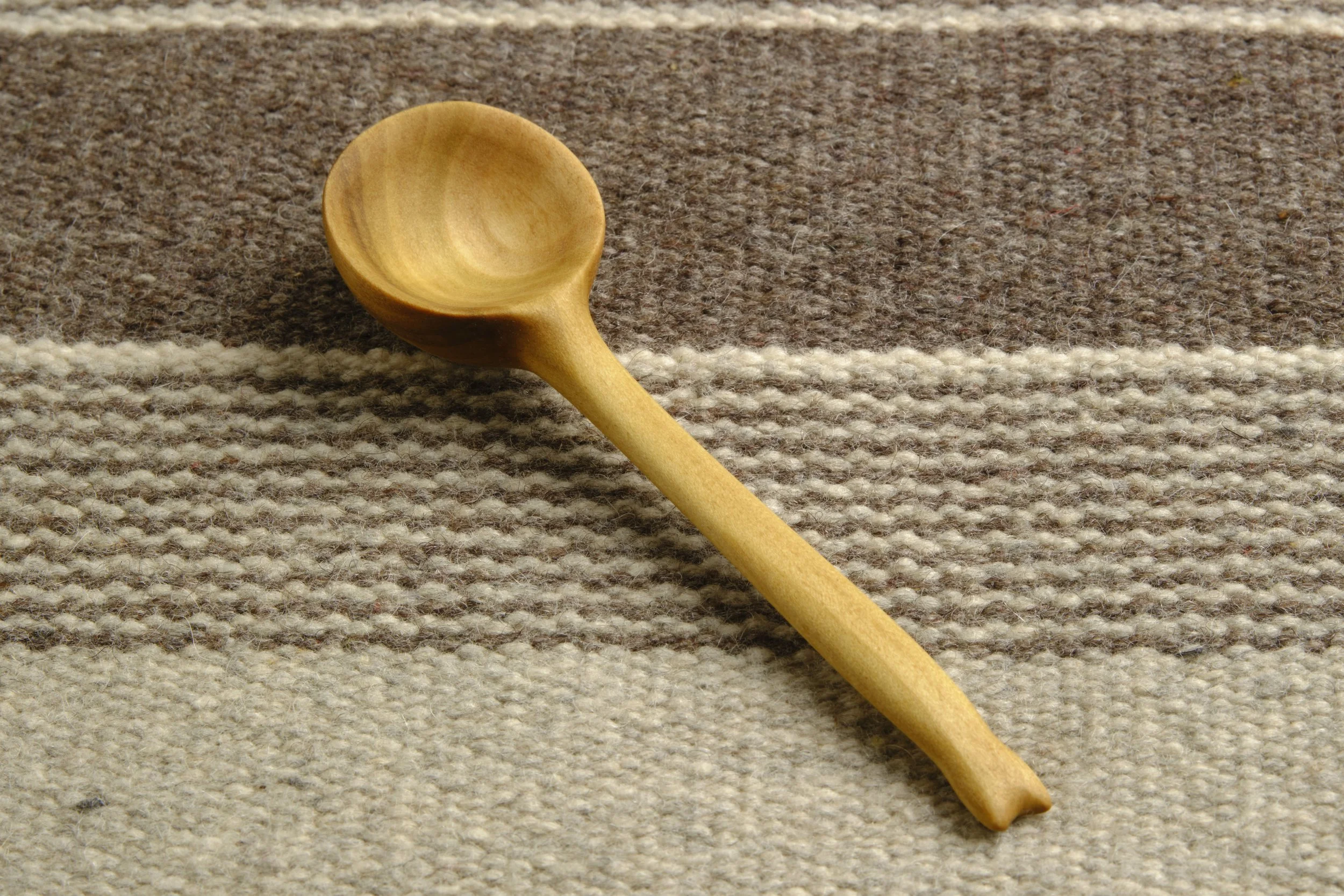 Hand-carved wooden tablespoon