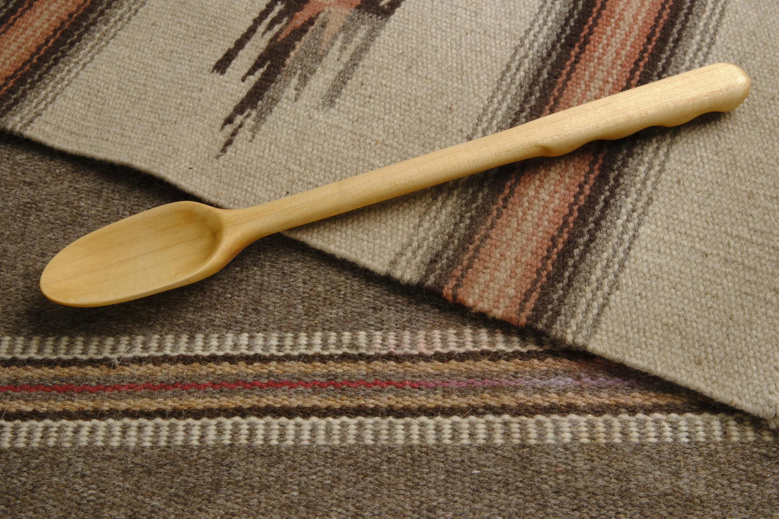 Hand-carved wooden serving spoon