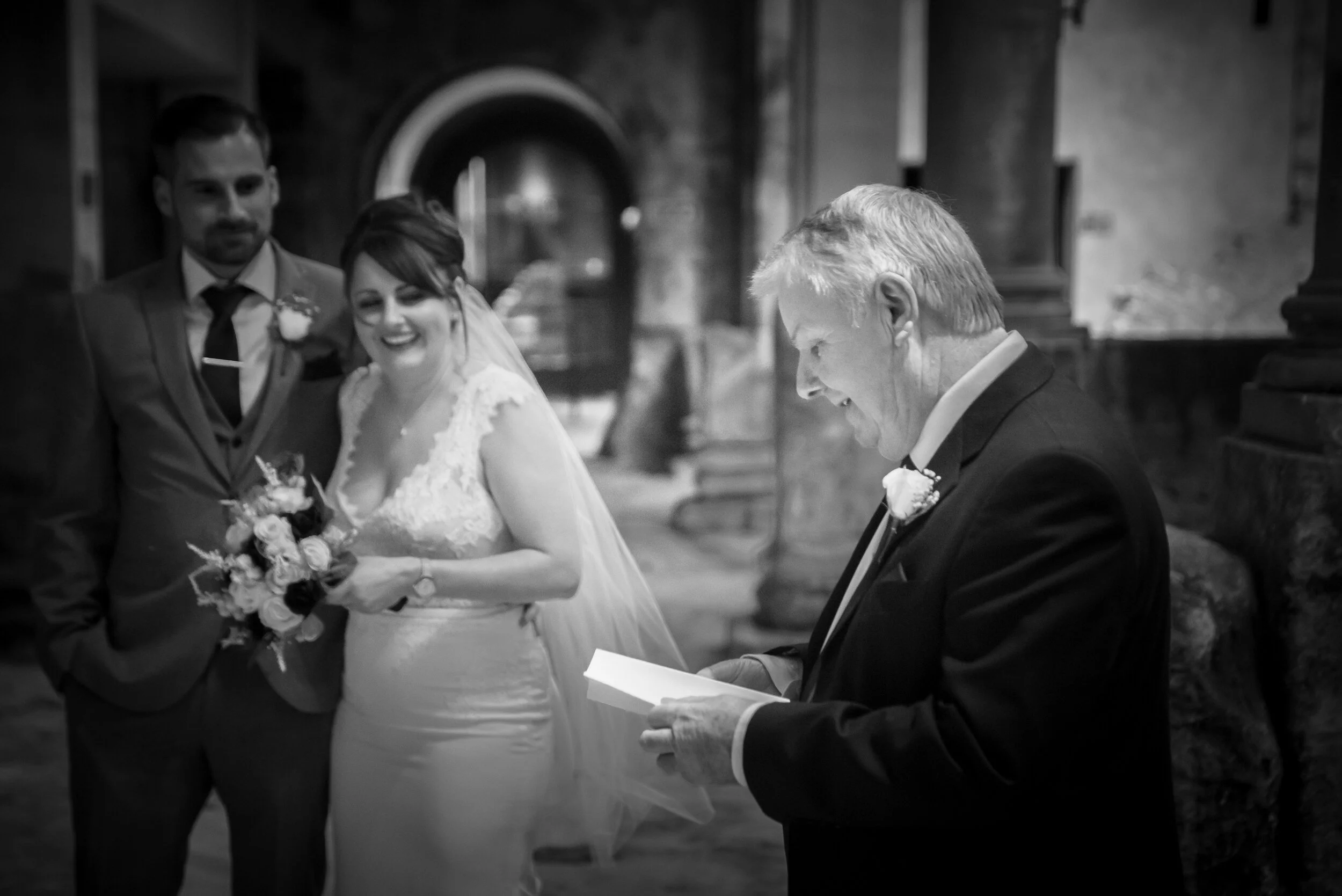 Bath Wedding Photographer capturing Father of the Bride reading speech out to bride and groom at Roman Baths, Bath