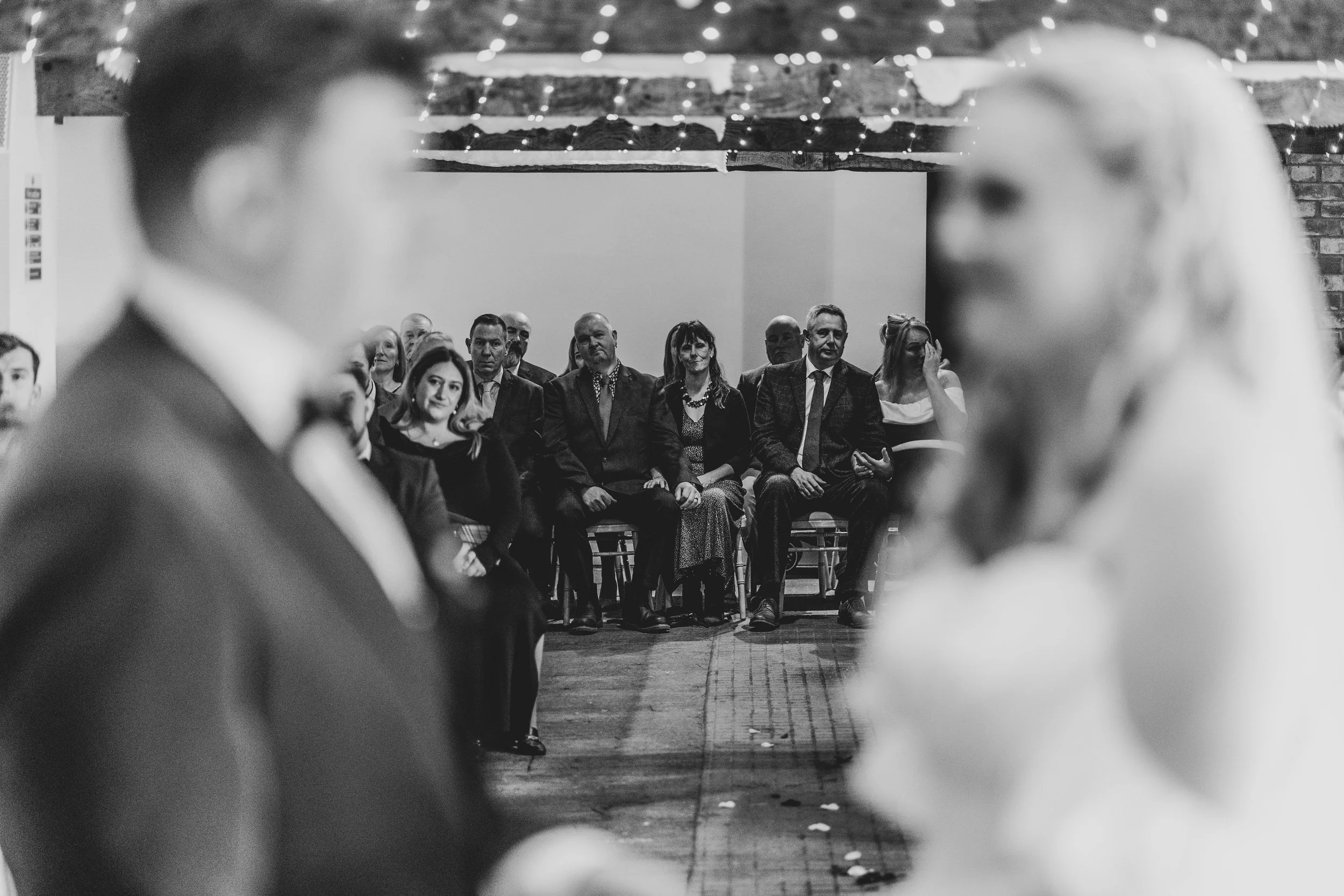 Guests looking on at Wedding Reception at Quantock Lakes