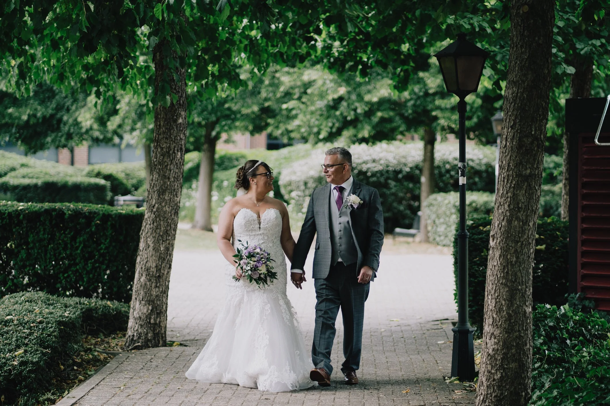 Older bride and groom after their wedding at Aztec Hotel and Spa in South Gloucestershire