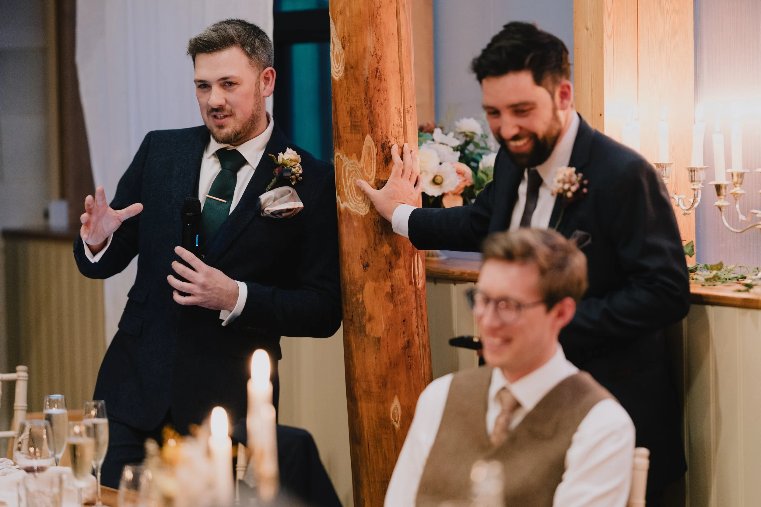 Best men tearing into the groom during the speech captured by Natural Bristol Wedding Photographer