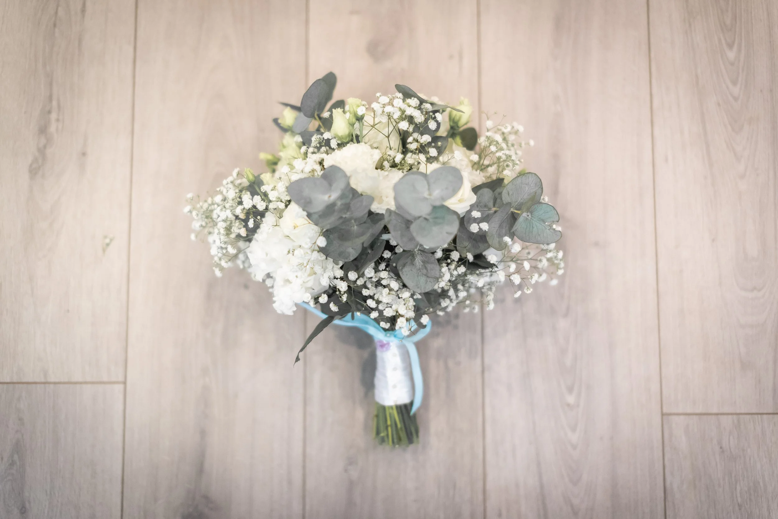 Floral flat lay of bouquet of flowers of the bride
