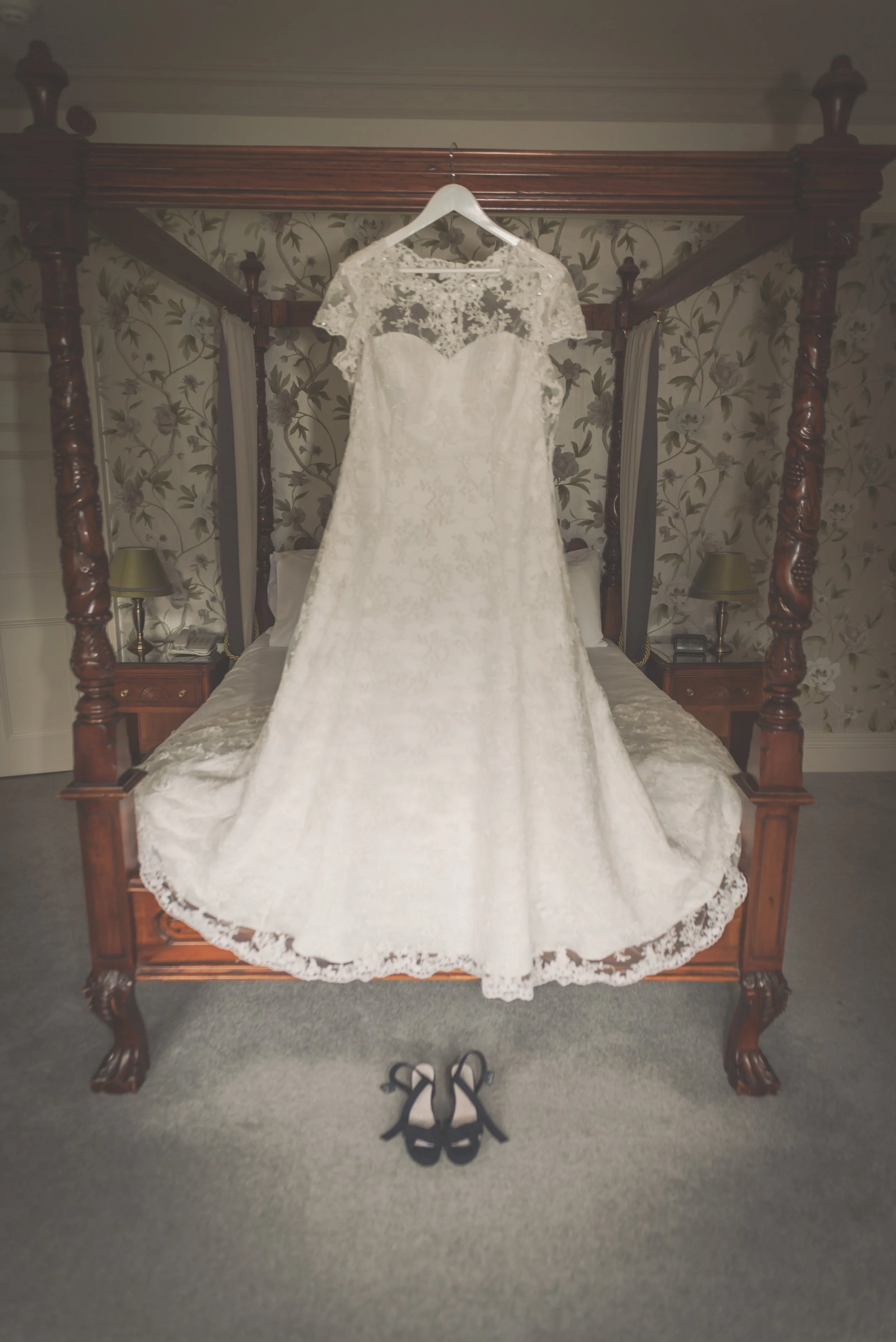 Wedding dress hung in the bridal prep room at Aldwick Estate
